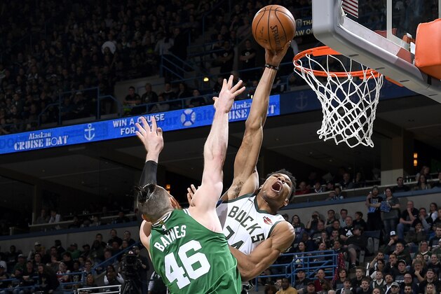 Milwaukee, WI - APRIL 20:  Giannis Antetokounmpo #34 of the Milwaukee Bucks dunks the ball against the Boston Celtics in Game Three of Round One of the 2018 NBA Playoffs on April 20, 2018 at the BMO Harris Bradley Center in Milwaukee, Wisconsin. NOTE TO USER: User expressly acknowledges and agrees that, by downloading and or using this Photograph, user is consenting to the terms and conditions of the Getty Images License Agreement. Mandatory Copyright Notice: Copyright 2018 NBAE (Photo by Brian Babineau/NBAE via Getty Images)