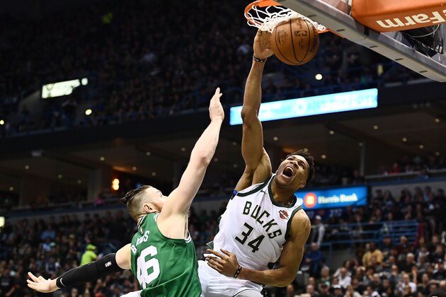 MILWAUKEE, WI - APRIL 20: Giannis Antetokounmpo #34 of the Milwaukee Bucks dunks over Aron Baynes #46 of the Boston Celtics during the second half of game three of round one of the Eastern Conference playoffs at the Bradley Center on April 20, 2018 in Milwaukee, Wisconsin. NOTE TO USER: User expressly acknowledges and agrees that, by downloading and or using this photograph, User is consenting to the terms and conditions of the Getty Images License Agreement. (Photo by Stacy Revere/Getty Images) MILWAUKEE, WI - APRIL 20: Giannis Antetokounmpo #34 of the Milwaukee Bucks dunks over Aron Baynes #46 of the Boston Celtics during the second half of game three of round one of the Eastern Conference playoffs at the Bradley Center on April 20, 2018 in Milwaukee, Wisconsin. NOTE TO USER: User expressly acknowledges and agrees that, by downloading and or using this photograph, User is consenting to the terms and conditions of the Getty Images License Agreement. (Photo by Stacy Revere/Getty Images)
