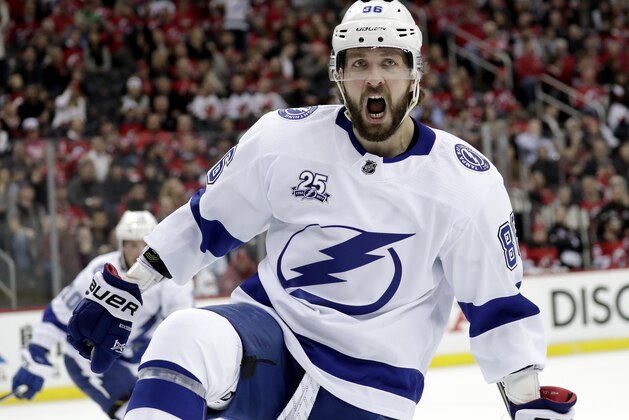 Tampa Bay Lightning right wing Nikita Kucherov, of Russia, celebrates his goal against the New Jersey Devils during the first period of Game 4 of an NHL first-round hockey playoff series Wednesday, April 18, 2018, in Newark, N.J. (AP Photo/Julio Cortez)