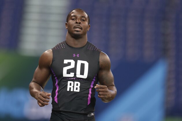 Georgia running back Sony Michel runs the 40-yard dash at the NFL football scouting combine in Indianapolis, Friday, March 2, 2018. (AP Photo/Michael Conroy)