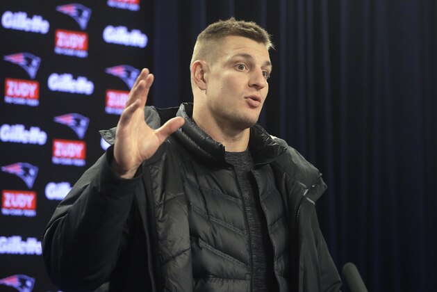 New England Patriots tight end Rob Gronkowski faces reporters during a news conference following an NFL football practice, Tuesday, Jan. 9, 2018, at Gillette Stadium, in Foxborough, Mass. The Patriots are scheduled to host the Tennessee Titans in an NFL divisional football AFC playoff game, Saturday, Jan. 13, 2018, in Foxborough. (AP Photo/Steven Senne)