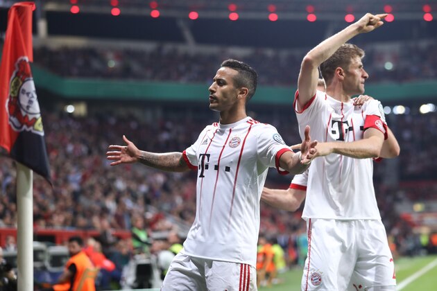 LEVERKUSEN, GERMANY - APRIL 17: Thiago Alcantara of Muenchen celebrates his team's fourth goal during the DFB Cup semi final match between Bayer 04 Leverkusen and Bayern Muenchen at BayArena on April 17, 2018 in Leverkusen, Germany. (Photo by Alex Grimm/Getty Images)