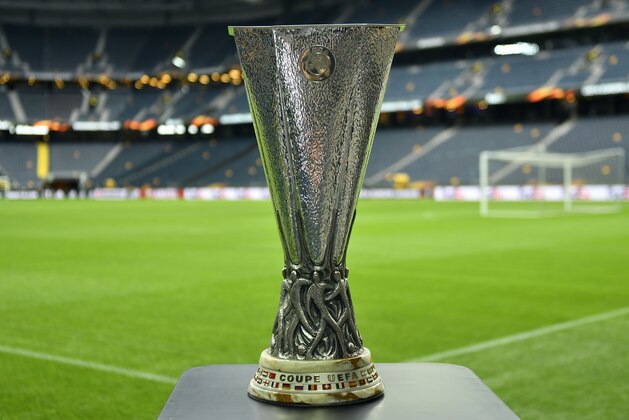 The Europa League trophy is on display on the pitch at the Friends Arena in Stockholm, Sweden, Tuesday, May 23, 2017. Ajax Amsterdam and Manchester United will play the soccer Europa League final in Stockholm on Wednesday, May 24. (AP Photo/Martin Meissner)