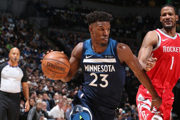 MINNEAPOLIS, MN -  APRIL 21: Jimmy Butler #23 of the Minnesota Timberwolves handles the ball against the Houston Rockets  in Game Three of Round One of the 2018 NBA Playoffs on April 21, 2018 at Target Center in Minneapolis, Minnesota. NOTE TO USER: User expressly acknowledges and agrees that, by downloading and or using this Photograph, user is consenting to the terms and conditions of the Getty Images License Agreement. Mandatory Copyright Notice: Copyright 2018 NBAE (Photo by David Sherman/NBAE via Getty Images)