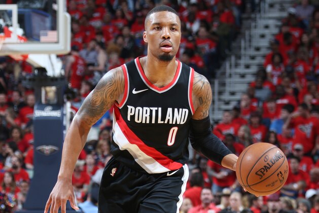 NEW ORLEANS, LA - APRIL 21: Damian Lillard #0 of the Portland Trail Blazers handles the ball against the New Orleans Pelicans in Game Four of Round One of the 2018 NBA Playoffs on April 21, 2018 at Smoothie King Center in New Orleans, Louisiana. NOTE TO USER: User expressly acknowledges and agrees that, by downloading and or using this Photograph, user is consenting to the terms and conditions of the Getty Images License Agreement. Mandatory Copyright Notice: Copyright 2018 NBAE (Photo by Layne Murdoch/NBAE via Getty Images)