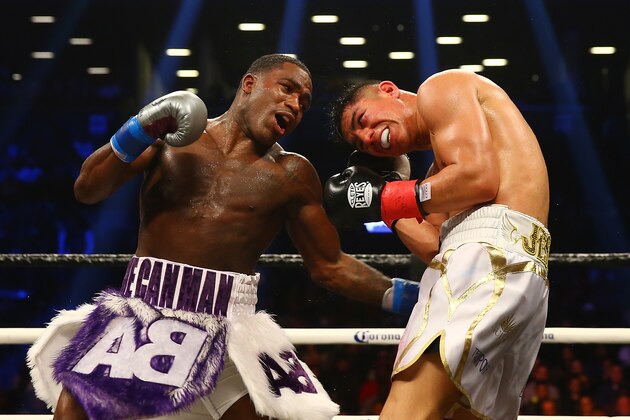 NEW YORK, NY - APRIL 21:  Jessie Vargas punches Adrien Broner during their Welterweight bout at Barclays Center on April 21, 2018 in New York City.  (Photo by Mike Stobe/Getty Images)