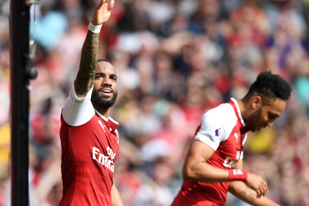 LONDON, ENGLAND - APRIL 22: Alexandre Lacazette of Arsenal celebrates scoring his side's third goal during the Premier League match between Arsenal and West Ham United at Emirates Stadium on April 22, 2018 in London, England. (Photo by Shaun Botterill/Getty Images) LONDON, ENGLAND - APRIL 22: Alexandre Lacazette of Arsenal celebrates scoring his side's third goal during the Premier League match between Arsenal and West Ham United at Emirates Stadium on April 22, 2018 in London, England. (Photo by Shaun Botterill/Getty Images)