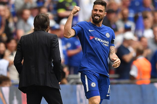 Chelsea's French striker Olivier Giroud (R) celebrates with Chelsea's Italian head coach Antonio Conte after scoring the opening goal during the English FA Cup semi-final football match between Chelsea and Southampton at Wembley Stadium in London, on April 22, 2018. (Photo by Ben STANSALL / AFP) / NOT FOR MARKETING OR ADVERTISING USE / RESTRICTED TO EDITORIAL USE        (Photo credit should read BEN STANSALL/AFP/Getty Images)