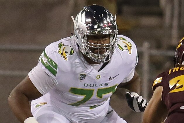 Oregon offensive lineman Tyrell Crosby (73) in the first half during an NCAA college football game against Arizona State, Saturday, Sept. 23, 2017, in Tempe, Ariz. (AP Photo/Rick Scuteri)