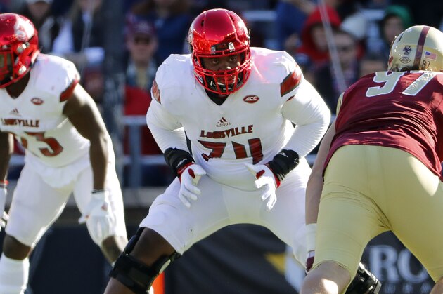 Louisville offensive lineman Geron Christian prepares to block against the Boston College during the first half of an NCAA football game at Alumni Stadium in Boston, Mass. Saturday, Nov. 5, 2016. (AP Photo/Winslow Townson)