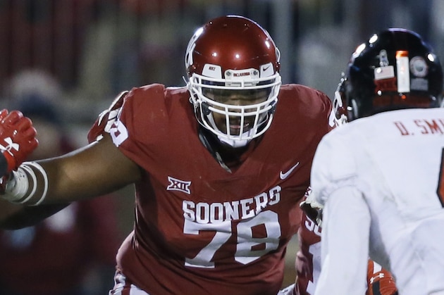 FILE - In this Oct. 28, 2017, file photo, Oklahoma offensive lineman Orlando Brown (78) blocks against Texas Tech during the second half of an NCAA college foot ball game in Norman, Okla. Quarterback Baker Mayfield, Brown and tight end Mark Andrews of Oklahoma were selected to the Associated Press All-America team, giving the Sooners more players on the first team than any school. The All-America team, was released Monday, Dec. 11, 2017. (AP Photo/Sue Ogrocki, File)