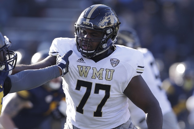 Western Michigan offensive lineman Chukwuma Okorafor seen during the second half of an NCAA college football game against Toledo, Friday, Nov. 24, 2017, in Toledo, Ohio. (AP Photo/Carlos Osorio)
