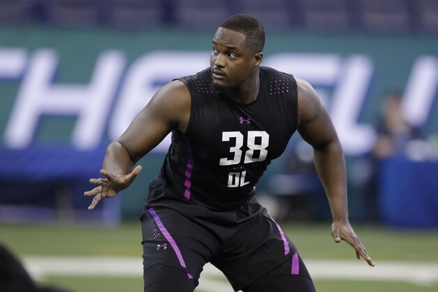 Wagner offensive lineman Greg Senat runs a drill during the NFL football scouting combine, Friday, March 2, 2018, in Indianapolis. (AP Photo/Darron Cummings)