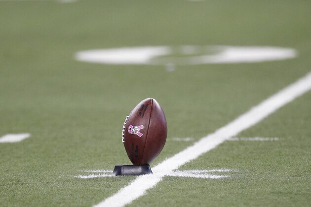 A football sits on a tee for kickoff for the Detroit Lions-St. Louis Rams NFL football game in Detroit,  Sunday, Oct. 10, 2010. (AP Photo/Paul Sancya)