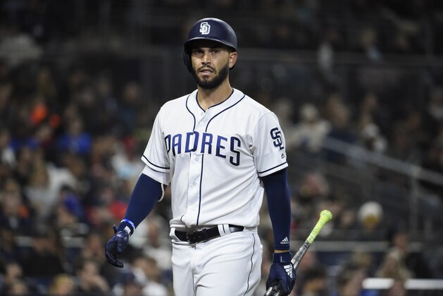 SAN DIEGO, CA - APRIL 4:  Eric Hosmer #30 of the San Diego Padres walks back to the dugout after striking out during the sixth inning of a baseball game against the Colorado Rockies at PETCO Park on April 4, 2018 in San Diego, California. (Photo by Denis Poroy/Getty Images)