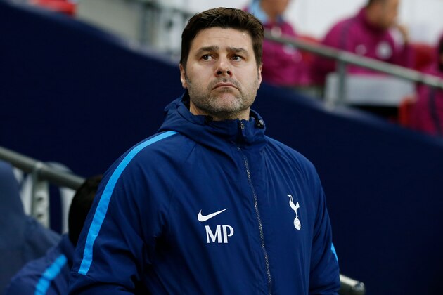 Tottenham Hotspur's Argentinian head coach Mauricio Pochettino awaits kick off in the English Premier League football match between Tottenham Hotspur and Manchester City at Wembley Stadium in London, on April 14, 2018. / AFP PHOTO / Ian KINGTON / RESTRICTED TO EDITORIAL USE. No use with unauthorized audio, video, data, fixture lists, club/league logos or 'live' services. Online in-match use limited to 75 images, no video emulation. No use in betting, games or single club/league/player publications.  /         (Photo credit should read IAN KINGTON/AFP/Getty Images)