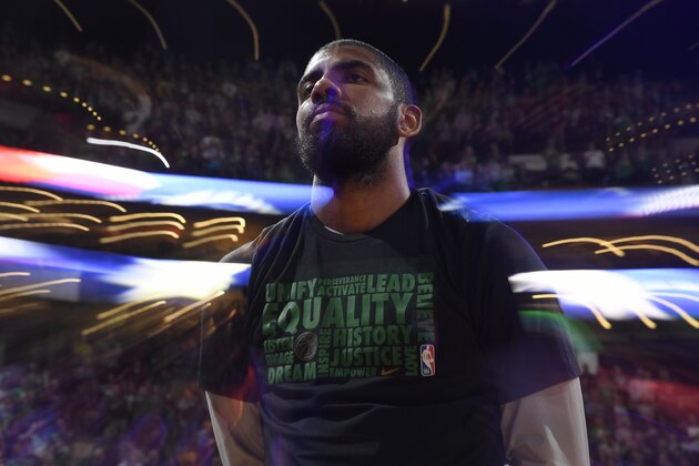 BOSTON, MA - FEBRUARY 28: Kyrie Irving #11 of the Boston Celtics stands with his team during the National Anthem before the game against the Charlotte Hornets on February 28, 2018 at the TD Garden in Boston, Massachusetts. NOTE TO USER: User expressly acknowledges and agrees that, by downloading and/or using this photograph, user is consenting to the terms and conditions of the Getty Images License Agreement. Mandatory Copyright Notice: Copyright 2018 NBAE (Photo by Brian Babineau/NBAE via Getty Images) BOSTON, MA - FEBRUARY 28: Kyrie Irving #11 of the Boston Celtics stands with his team during the National Anthem before the game against the Charlotte Hornets on February 28, 2018 at the TD Garden in Boston, Massachusetts. NOTE TO USER: User expressly acknowledges and agrees that, by downloading and/or using this photograph, user is consenting to the terms and conditions of the Getty Images License Agreement. Mandatory Copyright Notice: Copyright 2018 NBAE (Photo by Brian Babineau/NBAE via Getty Images)