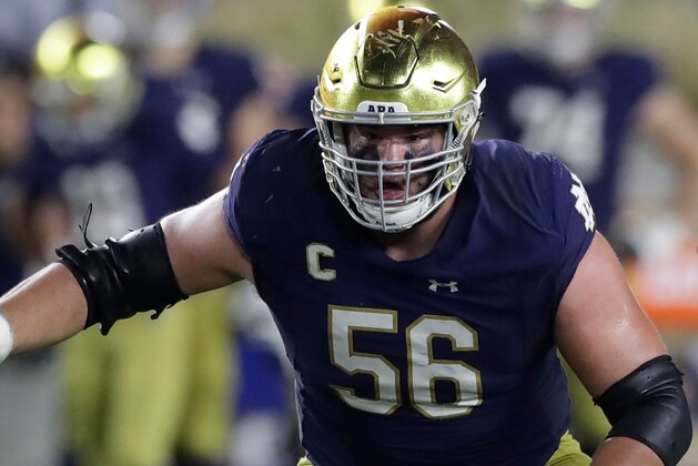 FILE - In this Oct. 21, 2017, file photo, Notre Dame offensive lineman Quenton Nelson defends the line during the first half of an NCAA football game against Southern California,in South Bend, Ind. Neldson is expected to be a first round pick in the NFL Draft.(AP Photo/Carlos Osorio)