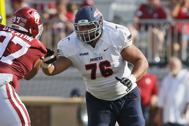 UTEP's Will Hernandez (76) blocks against Oklahoma defensive tackle Marquise Overton (97) during an NCAA college football game between UTEP and Oklahoma in Norman, Okla., Saturday, Sept. 2, 2017. (AP Photo/Sue Ogrocki)