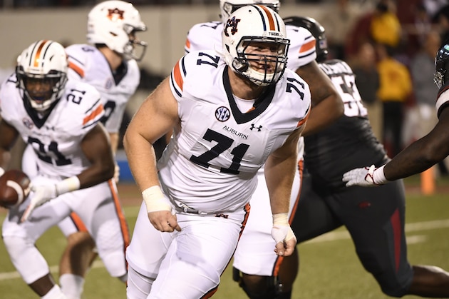 Auburn lineman Braden Smith (71) blocks against the Arkansas defense during the first half of an NCAA college football game in Fayetteville, Ark., Saturday, Oct. 21, 2017. (AP Photo/Michael Woods)