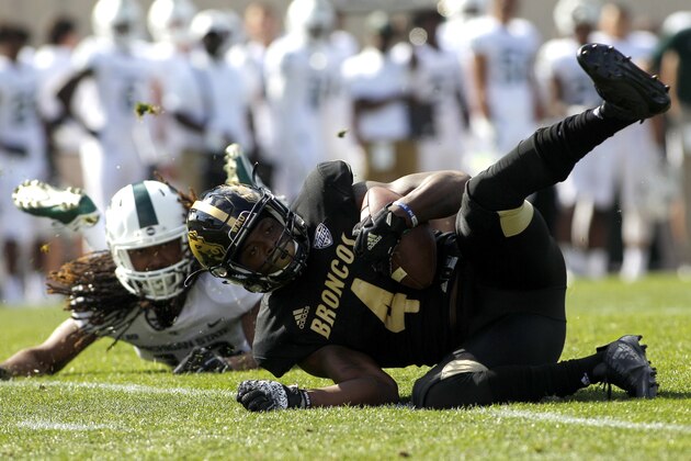 Western Michigan's Darius Phillips, right, intercepts a pass intended for Michigan State's Felton Davis III, left, during the second quarter of an NCAA college football game, Saturday, Sept. 9, 2017, in East Lansing, Mich. (AP Photo/Al Goldis)