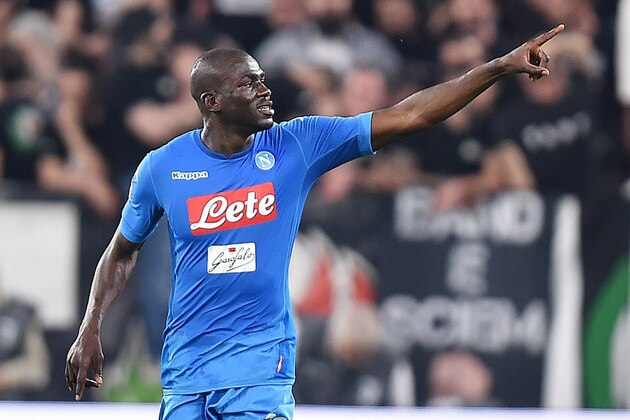 Napoli's kaliodou Koulibaly celebrates after scoring during a Serie A soccer match between Juventus and Napoli at the Allianz Stadium in Turin, Italy, Sunday, April 22, 2018. (Alessandro Di Marco/ANSA via AP)