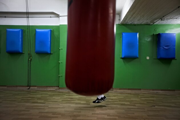 In this picture taken on Tuesday, Feb. 28, 2012, a young Israeli young boxer jumps rope ahead of the Israel's National Youth Boxing Championship at a boxing club in the southern Israeli town of Sderot. Boxing provides a unique chance for young Arab and Jewish competitors to meet in the ring as equals, equipped with helmets and gloves and playing under the same set of rules. (AP Photo/Oded Balilty)