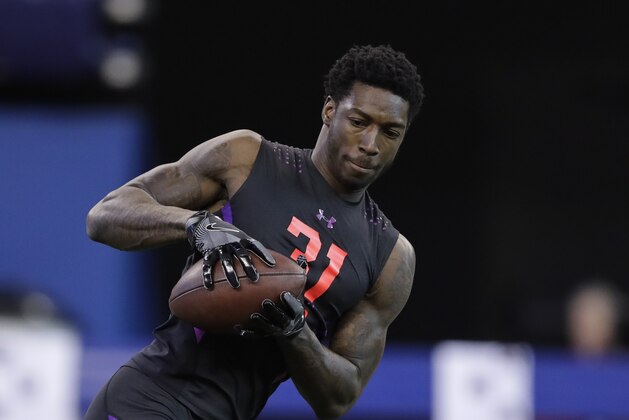 Alabama wide receiver Calvin Ridley runs a drill during the NFL football scouting combine, Saturday, March 3, 2018, in Indianapolis. (AP Photo/Darron Cummings)