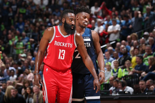 MINNEAPOLIS, MN - APRIL 23:  James Harden #13 of the Houston Rockets and Jimmy Butler #23 of the Minnesota Timberwolves look on in Game Four of Round One of the 2018 NBA Playoffs on April 23, 2018 at Target Center in Minneapolis, Minnesota. NOTE TO USER: User expressly acknowledges and agrees that, by downloading and or using this Photograph, user is consenting to the terms and conditions of the Getty Images License Agreement. Mandatory Copyright Notice: Copyright 2018 NBAE (Photo by David Sherman/NBAE via Getty Images)