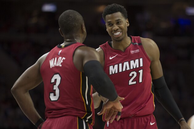 PHILADELPHIA, PA - APRIL 16: Dwyane Wade #3 of the Miami Heat talks with Hassan Whiteside #21 in the second quarter against the Philadelphia 76ers during Game Two of the first round of the 2018 NBA Playoff at Wells Fargo Center on April 16, 2018 in Philadelphia, Pennsylvania. NOTE TO USER: User expressly acknowledges and agrees that, by downloading and or using this photograph, User is consenting to the terms and conditions of the Getty Images License Agreement. (Photo by Mitchell Leff/Getty Images)