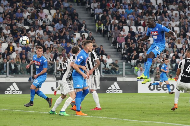 TURIN, ITALY - APRIL 22: Kalidou Koulibaly of SSC Napoli scores a goal during the serie A match between Juventus and SSC Napoli on April 22, 2018 in Turin, Italy.  (Photo by Gabriele Maltinti/Getty Images)