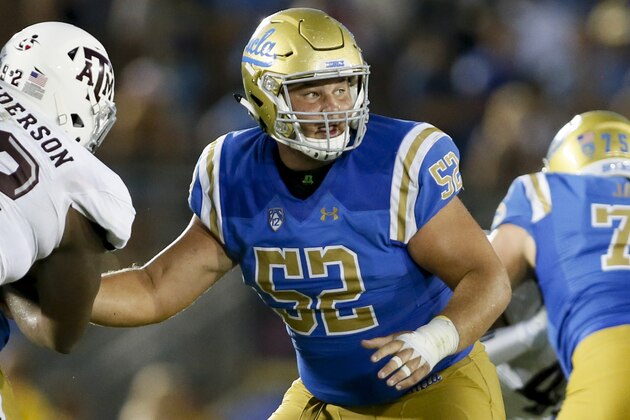 UCLA offensive lineman Scott Quessenberry looks to block against Texas A&M defensive lineman Zaycoven Henderson during an NCAA college football game, Sunday, Sept. 3, 2017, in Pasadena, Calif. UCLA won 45-44. (AP Photo/Danny Moloshok)