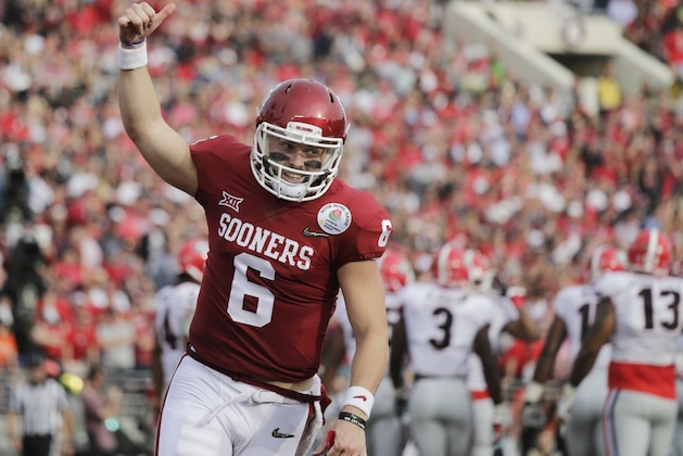 Oklahoma quarterback Baker Mayfield celebrates after running back Rodney Anderson scored a touchdown against Georgia during the first half of the Rose Bowl NCAA college football game Monday, Jan. 1, 2018, in Pasadena, Calif. (AP Photo/Jae C. Hong)