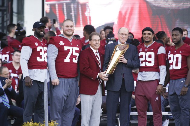 Alabama head coach Nick Saban holds up the National Championship trophy during the NCAA college football national championship celebration, Saturday, Jan. 20, 2018, in Tuscaloosa, Ala. Alabama won the national championship game against Georgia 26-23 in overtime. (AP Photo/Brynn Anderson) Alabama head coach Nick Saban holds up the National Championship trophy during the NCAA college football national championship celebration, Saturday, Jan. 20, 2018, in Tuscaloosa, Ala. Alabama won the national championship game against Georgia 26-23 in overtime. (AP Photo/Brynn Anderson)