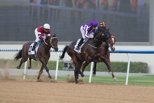DUBAI, UNITED ARAB EMIRATES - MARCH 31: Ryan Moore riding Mendelssohn wins the UAE Derby during the Dubai World Cup Day at Meydan Racecourse on March 31, 2018 in Dubai, United Arab Emirates.