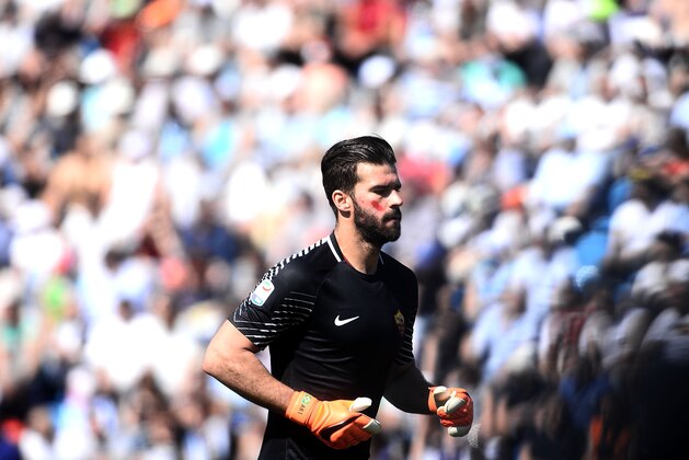 FERRARA, ITALY - APRIL 21: Alisson Becker of AS Roma looks on during the serie A match between Spal and AS Roma at Stadio Paolo Mazza on April 21, 2018 in Ferrara, Italy.  (Photo by Mario Carlini / Iguana Press/Getty Images)