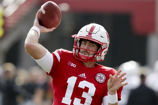 Nebraska quarterback Tanner Lee (13) warms up before an NCAA college football game against Northwestern in Lincoln, Neb., Saturday, Nov. 4, 2017. (AP Photo/Nati Harnik)