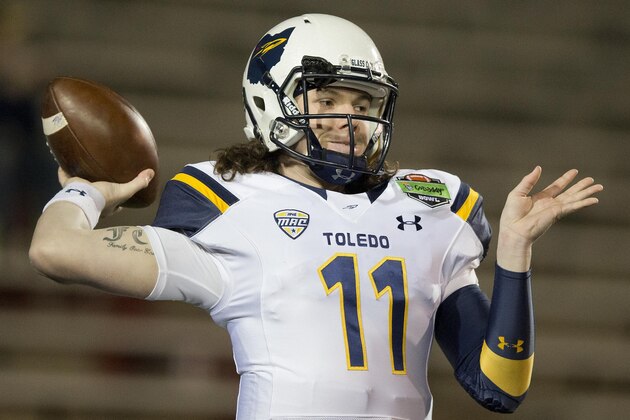 Toledo quarterback Logan Woodside (11) pass the ball during the first half of the GoDaddy Bowl NCAA college football game, Sunday, Jan. 4, 2015, in Mobile, Ala. (AP Photo/Brynn Anderson)