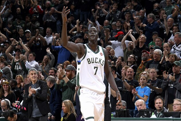 Milwaukee, WI - APRIL 20:  Thon Maker #7 of the Milwaukee Bucks addresses the crowd during the game against the Boston Celtics in Game Three of Round One of the 2018 NBA Playoffs on April 20, 2018 at the BMO Harris Bradley Center in Milwaukee, Wisconsin. NOTE TO USER: User expressly acknowledges and agrees that, by downloading and or using this Photograph, user is consenting to the terms and conditions of the Getty Images License Agreement. Mandatory Copyright Notice: Copyright 2018 NBAE (Photo by Brian Babineau/NBAE via Getty Images)