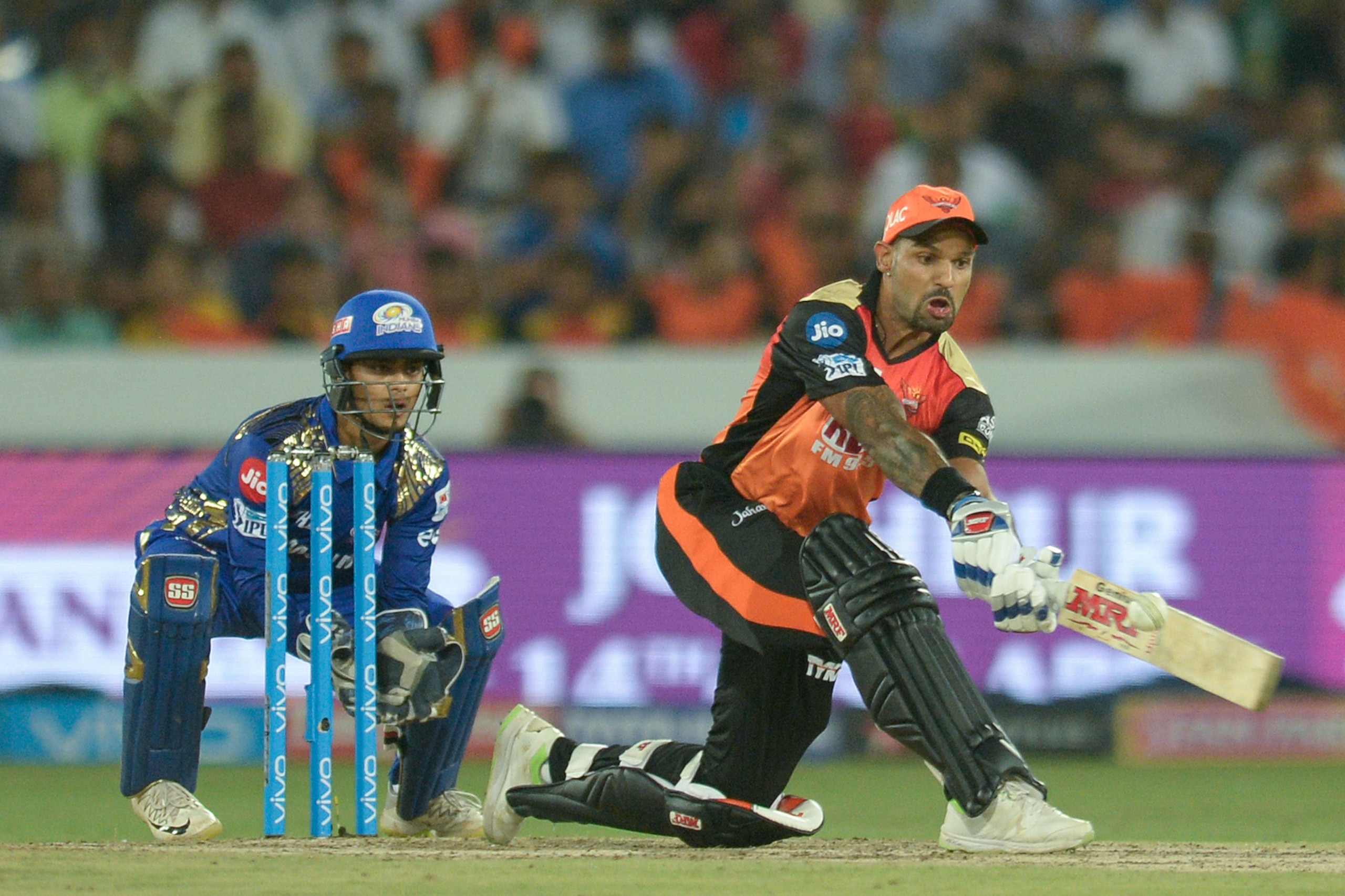Sunrisers Hyderabad cricketer Shikhar Dhawan plays a shot during the 2018 Indian Premier League (IPL) Twenty20 cricket match between Sunrisers Hyderabad and Mumbai Indians at the Rajiv Gandhi International Cricket Stadium in Hyderabad on April 12, 2018. / AFP PHOTO / NOAH SEELAM        (Photo credit should read NOAH SEELAM/AFP/Getty Images)