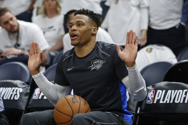 Oklahoma City Thunder guard Russell Westbrook (0) sits on the bench before the start of Game 4 of an NBA basketball first-round playoff series against the Utah Jazz Monday, April 23, 2018, in Salt Lake City. (AP Photo/Rick Bowmer)
