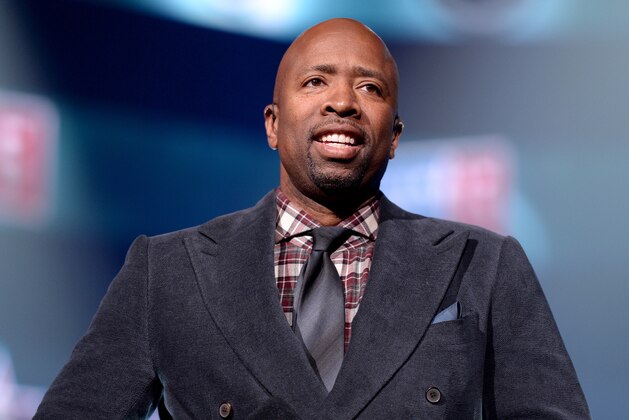 NEW YORK, NY - FEBRUARY 12:  Basketball player Kenny Smith speaks onstage as Fall Out Boy takes the stage at American Express All-Star Live at Hammerstein Ballroom broadcast live on TNT to tip-off NBA All-Star 2015 on February 12, 2015 in New York City.  (Photo by Stephen Lovekin/Getty Images for American Express)