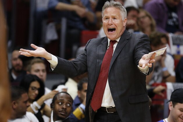 Philadelphia 76ers head coach Brett Brown directs his team in the first quarter of play against the Miami Heat in Game 4 of a first-round NBA basketball playoff series, Saturday, April 21, 2018, in Miami. (AP Photo/Joe Skipper)