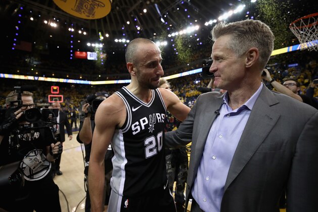 OAKLAND, CA - APRIL 24:  Manu Ginobili #20 of the San Antonio Spurs talks to head coach Steve Kerr of the Golden State Warriors after the Warriors beat the Spurs in Game Five of Round One of the 2018 NBA Playoffs at ORACLE Arena on April 24, 2018 in Oakland, California.  NOTE TO USER: User expressly acknowledges and agrees that, by downloading and or using this photograph, User is consenting to the terms and conditions of the Getty Images License Agreement.  (Photo by Ezra Shaw/Getty Images)