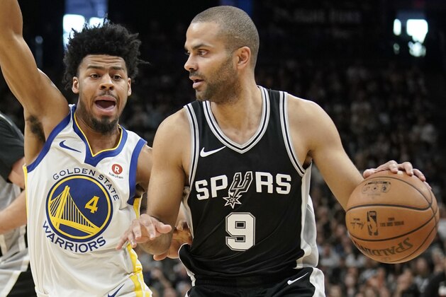 San Antonio Spurs' Tony Parker (9) drives against Golden State Warriors' Quinn Cook during the second half of Game 4 of a first-round NBA basketball playoff series in San Antonio, Sunday, April 22, 2018, in San Antonio. San Antonio won 103-90. (AP Photo/Darren Abate)