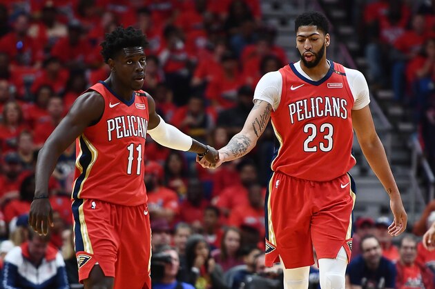 NEW ORLEANS, LA - APRIL 21: Anthony Davis #23 of the New Orleans Pelicans congratulates Jrue Holiday #11 during Game Four of the first round of the Western Conference playoffs against the Portland Trail Blazers at the Smoothie King Center on April 21, 2018 in New Orleans, Louisiana. The Pelicans defeated the Trail Blazers 131-123 to sweep the series 4-0. NOTE TO USER: User expressly acknowledges and agrees that, by downloading and or using this photograph, User is consenting to the terms and conditions of the Getty Images License Agreement. (Photo by Stacy Revere/Getty Images) NEW ORLEANS, LA - APRIL 21: Anthony Davis #23 of the New Orleans Pelicans congratulates Jrue Holiday #11 during Game Four of the first round of the Western Conference playoffs against the Portland Trail Blazers at the Smoothie King Center on April 21, 2018 in New Orleans, Louisiana. The Pelicans defeated the Trail Blazers 131-123 to sweep the series 4-0. NOTE TO USER: User expressly acknowledges and agrees that, by downloading and or using this photograph, User is consenting to the terms and conditions of the Getty Images License Agreement. (Photo by Stacy Revere/Getty Images)