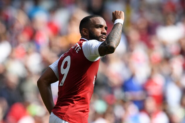 LONDON, ENGLAND - APRIL 22:  Alexandre Lacazette of Arsenal celebrates scoring his side's third goal during the Premier League match between Arsenal and West Ham United at Emirates Stadium on April 22, 2018 in London, England.  (Photo by Shaun Botterill/Getty Images)