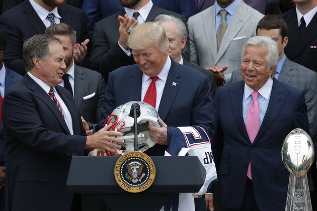 WASHINGTON, DC - APRIL 19: New England Patriots Head Coach Bill Belichick (L) and team owner Robert Kraft (R) present a football helmet to U.S. President Donald Trump during a celebration of the team's Super Bowl victory on the South Lawn at the White House April 19, 2017 in Washington, DC. It was the team's fifth Super Bowl victory since 1960. (Photo by Chip Somodevilla/Getty Images) WASHINGTON, DC - APRIL 19: New England Patriots Head Coach Bill Belichick (L) and team owner Robert Kraft (R) present a football helmet to U.S. President Donald Trump during a celebration of the team's Super Bowl victory on the South Lawn at the White House April 19, 2017 in Washington, DC. It was the team's fifth Super Bowl victory since 1960. (Photo by Chip Somodevilla/Getty Images)