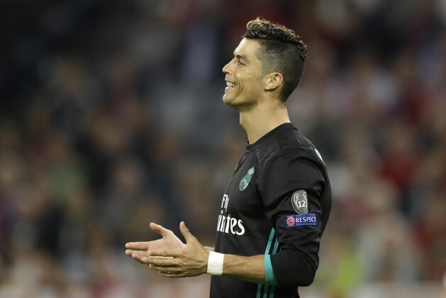 Real Madrid's Cristiano Ronaldo reacts during the semifinal first leg soccer match between FC Bayern Munich and Real Madrid at the Allianz Arena stadium in Munich, Germany, Wednesday, April 25, 2018. (AP Photo/Matthias Schrader)