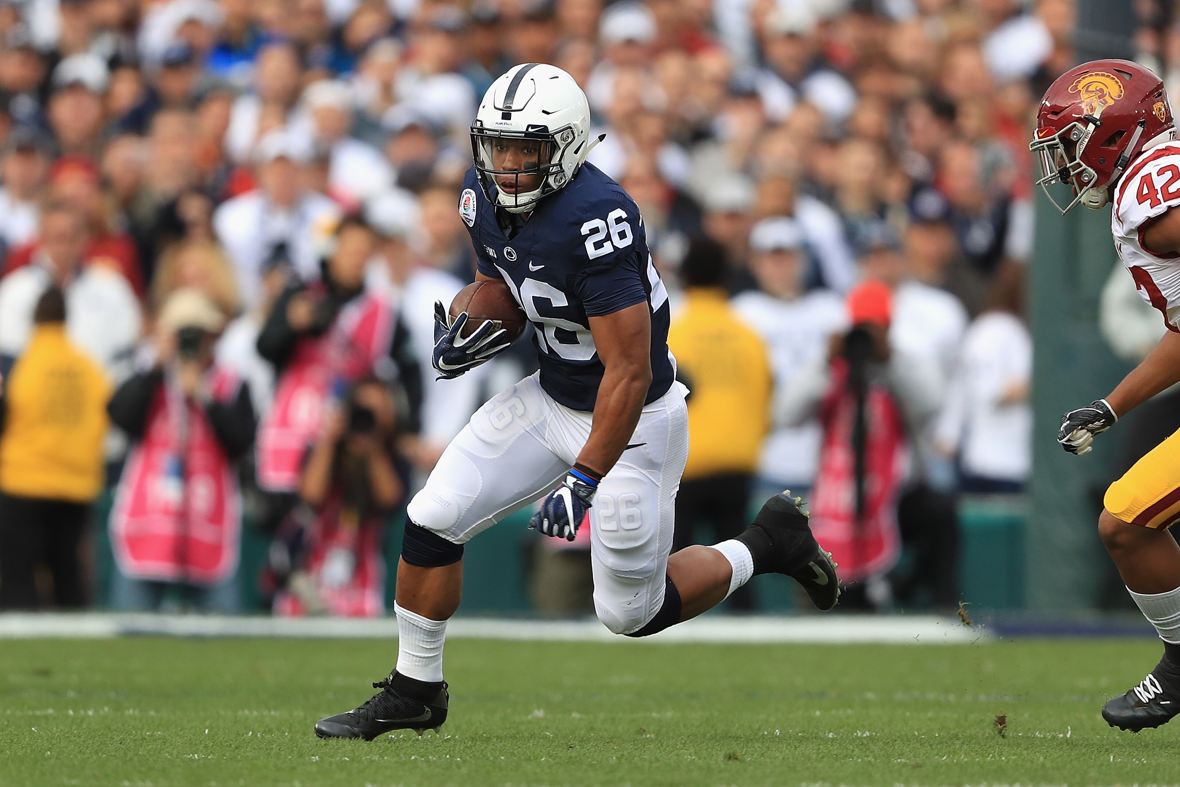 PASADENA, CA - JANUARY 02:  Running back Saquon Barkley #26 of the Penn State Nittany Lions runs with the ball against the USC Trojans during the 2017 Rose Bowl Game presented by Northwestern Mutual at the Rose Bowl on January 2, 2017 in Pasadena, California.  (Photo by Sean M. Haffey/Getty Images)